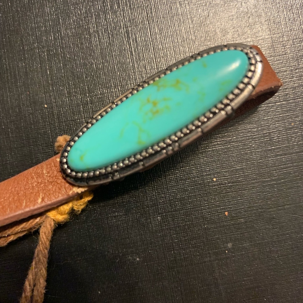 Turquoise and leather bracelet.